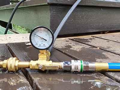 Pressure-testing a pool line with a gauge