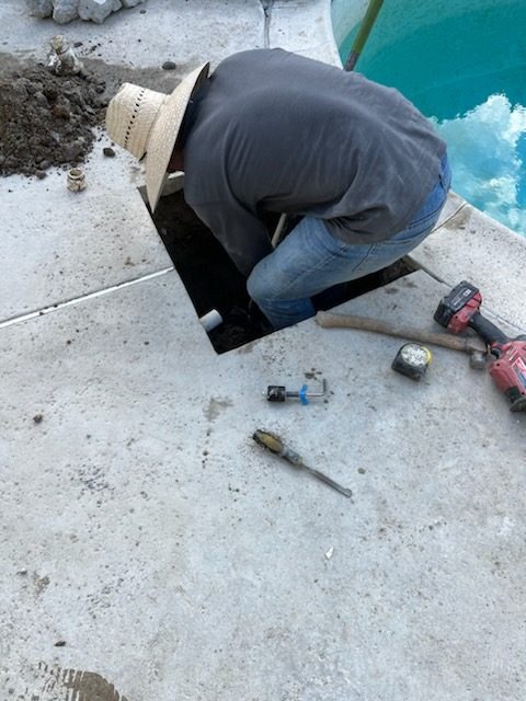 Repairing a pool line under the deck
